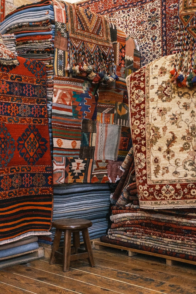 Cultural significance and storytelling aspects depicted in these rugs